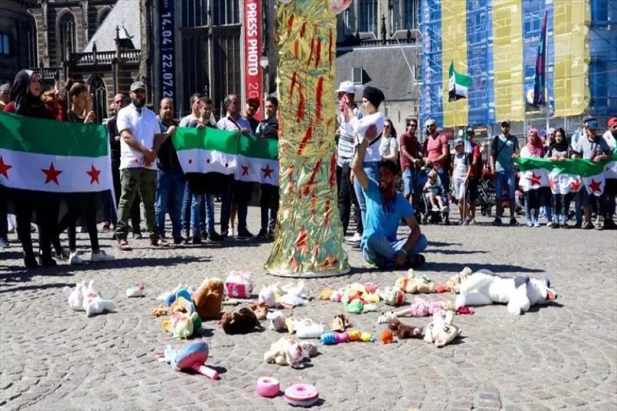 مظاهرة مناهضة لروسيا والأسد في أمستردام تطالب بوقف قتل المدنيين في درعا