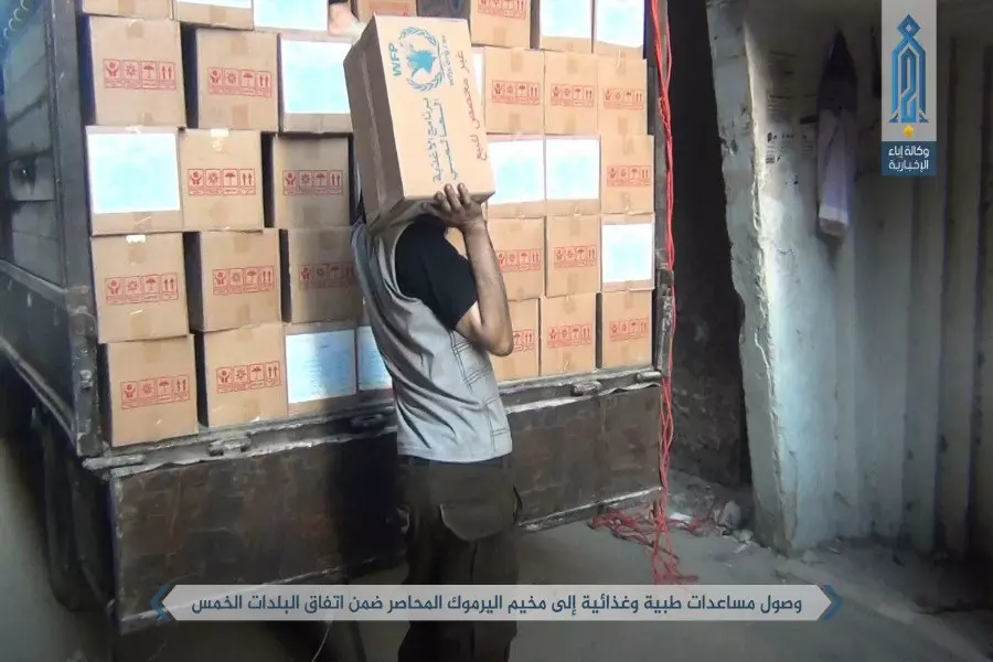 دخول قافلة مساعدات إلى مخيم اليرموك جنوب العاصمة دمشق ضمن اتفاق "المدن الخمس"
