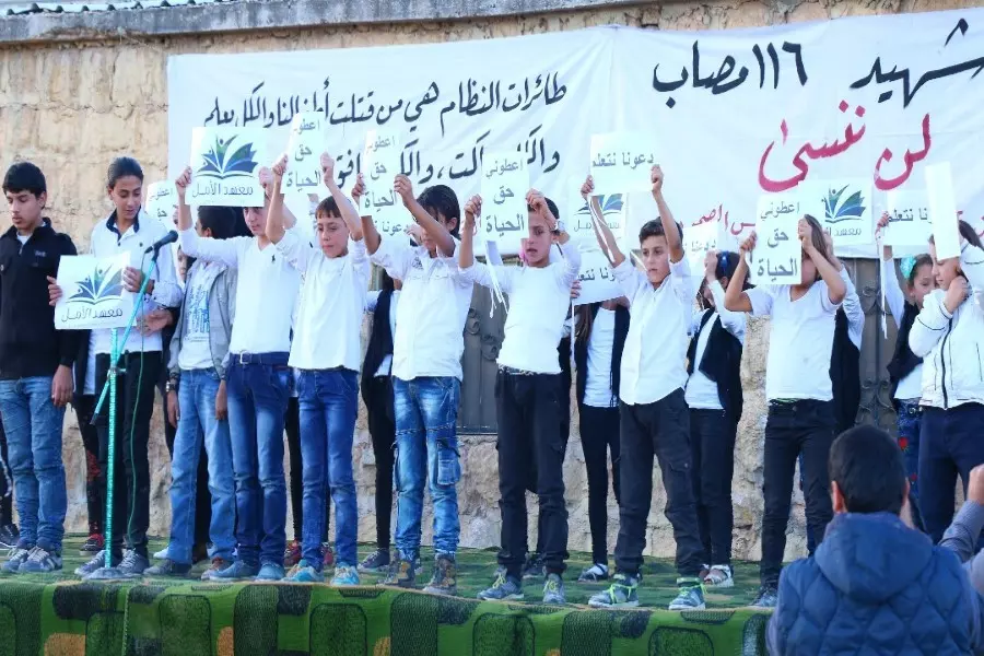 فعاليات مدينة تحيي الذكرى الأولى لمجزرة الأقلام في بلدة حاس بإدلب