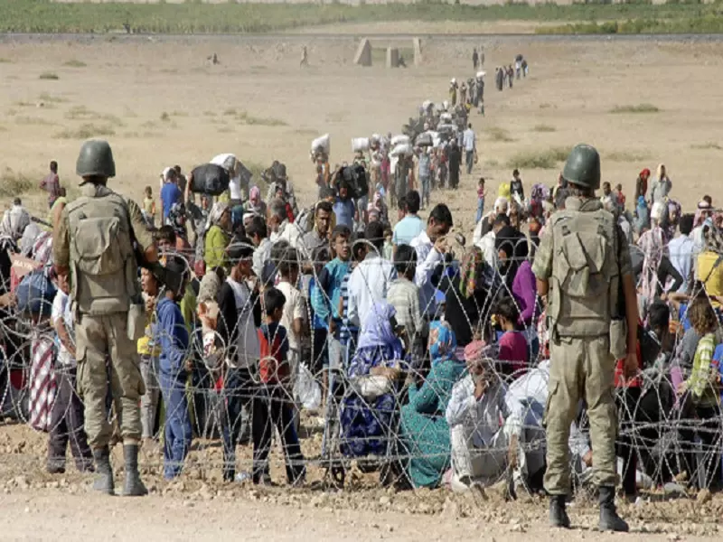 ألفا لاجئ يعبرون إلى تركيا بسبب المعارك في الشمال