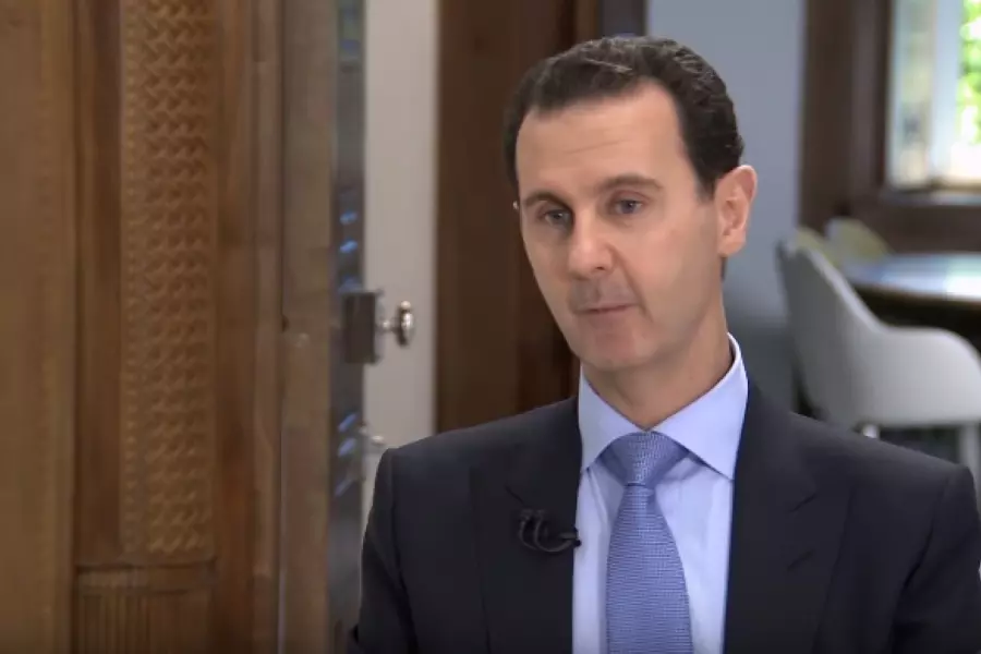 المجرم الأسد يلمح لإقامة قواعد عسكرية إيرانية ويهدد بمواصلة استخدام القوة في حال فشل الحل السياسي