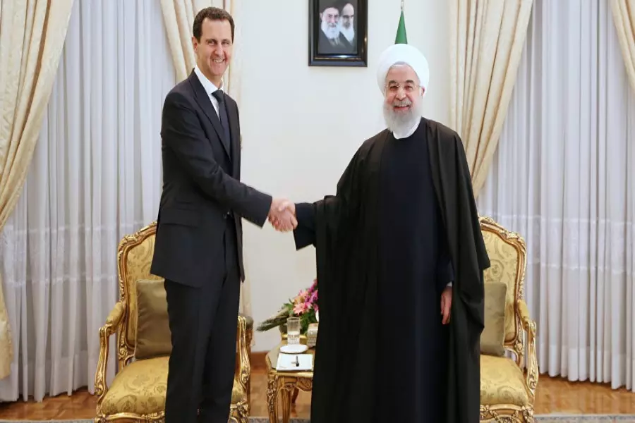 زيارة محتملة للرئيس الإيراني حسن روحاني إلى المجرم بشار الأسد قريبا