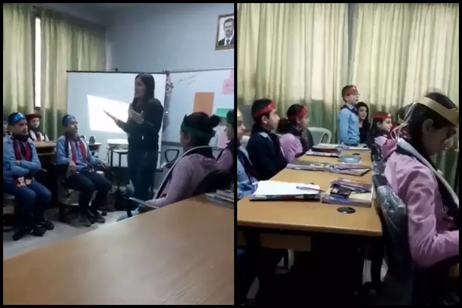 فيديو مثير للجدل .. مُدرسة تعلم تلاميذها شعارات تمجيد وتأييد رأس النظام ..!!