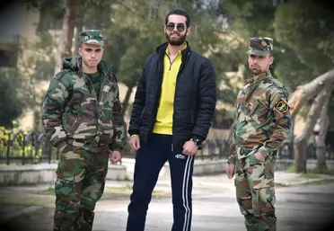 دورية أمنية تعتقل صحفياً موالياً للنظام في حلب