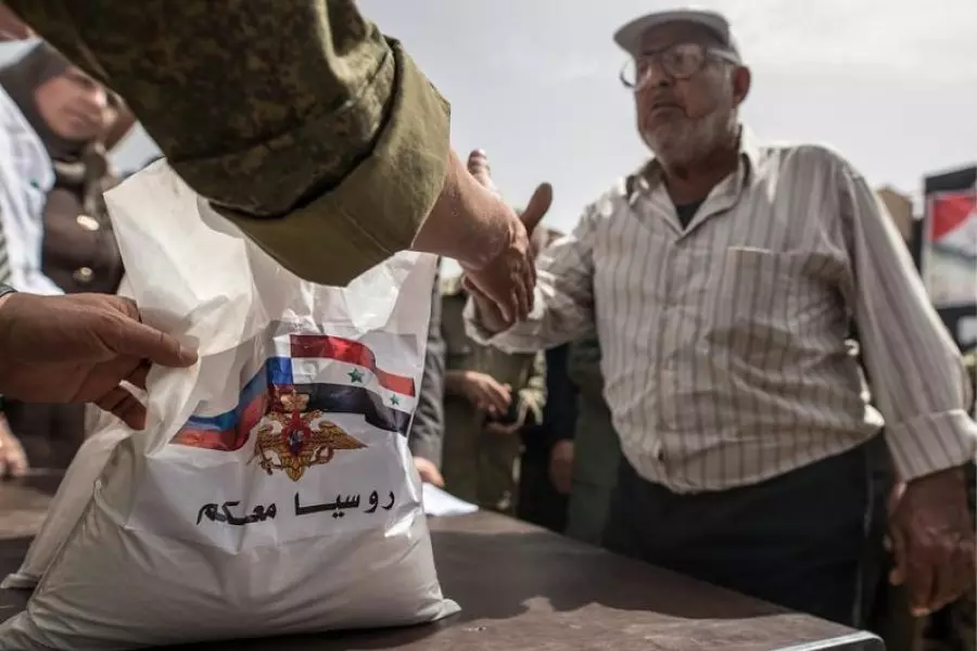 من باب المساعدات ... روسيا وأدواتها تتغلغل في المجتمع السوري بريف اللاذقية