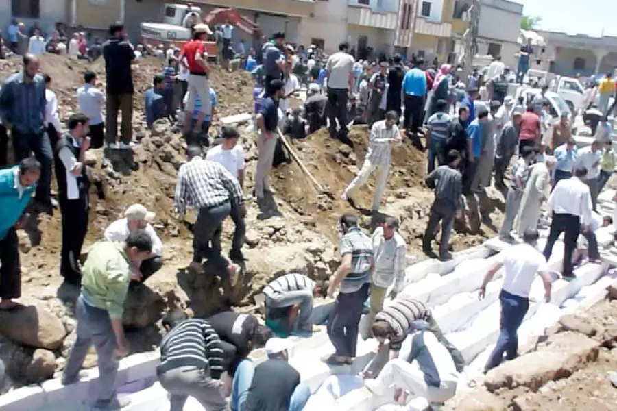 القانونيين السوريين: "مجزرة الحولة" جريمة إبادة جماعية وضد الإنسانية مكتملة الأركان