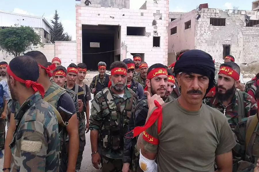 لواء "القدس" يجند سكان مخيم حمص للاجئين الفلسطنيين للقتال إلى جانب الأسد