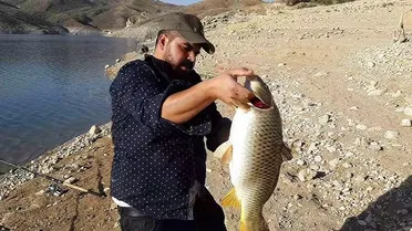 صيد الأسماك في نهر العاصي: بين شح المياه والتلوث وتراجع الثروة السمكية