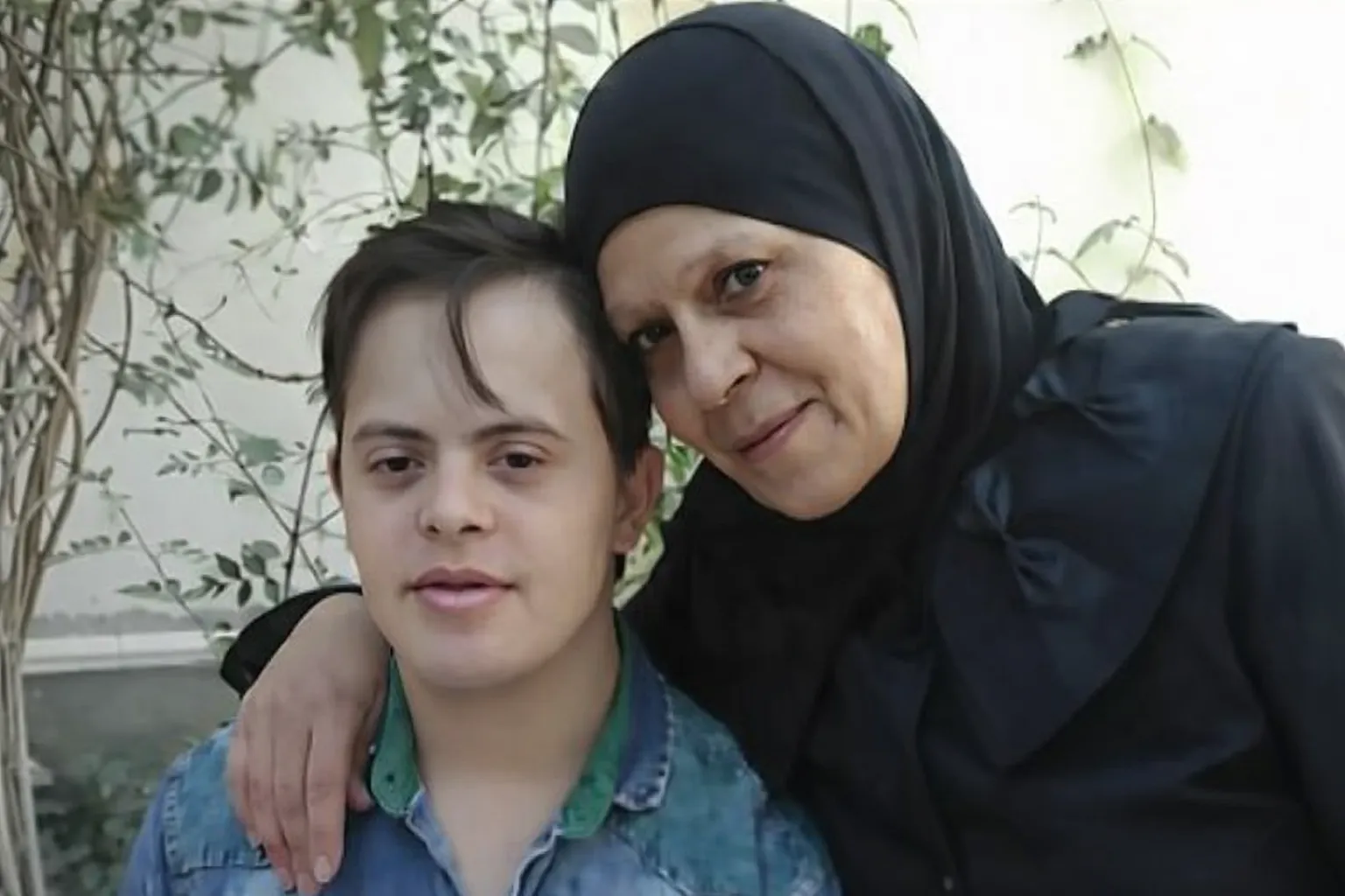 معاناة الأمهات مع الأطفال ذوي الإعاقة